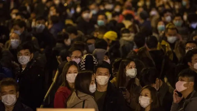 A crowd wearing face masks in Hong Kong
