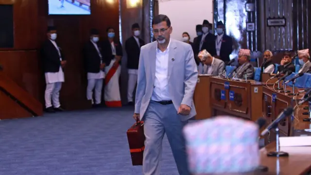 अर्थमन्त्री शर्मा