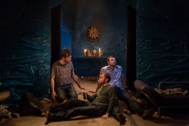 Conor Madden (right) with fellow actors on the set of Flights