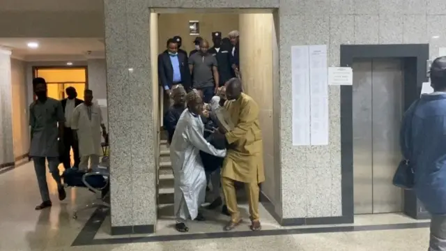 Abba Kyari wife wen she faint for court