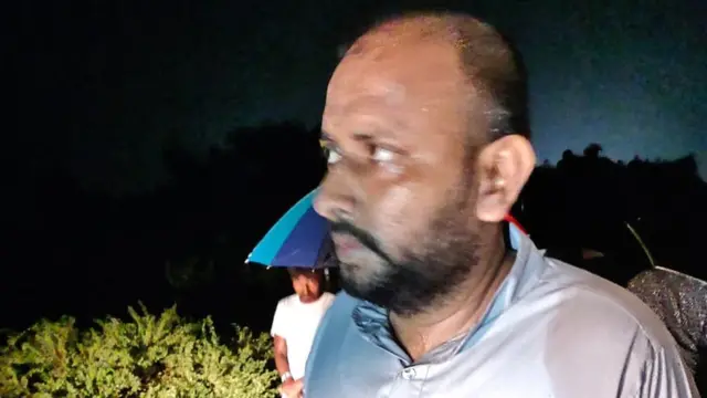 కారు నుంచి బయటపడిన మొహ్మద్ ఇర్షాద్