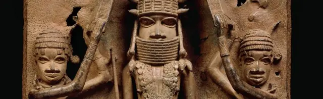 A brass plaque under the Benin Bronzes collection
