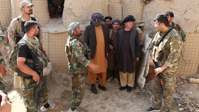 Маршал Дўстум жангчилари билан