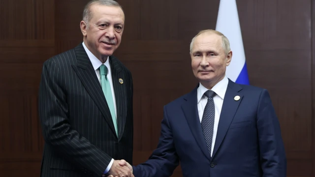 Erdogan apertando a mãoluva bet afiliadosPutin 