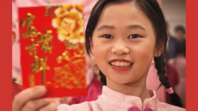 Young girl dey hold red envelope