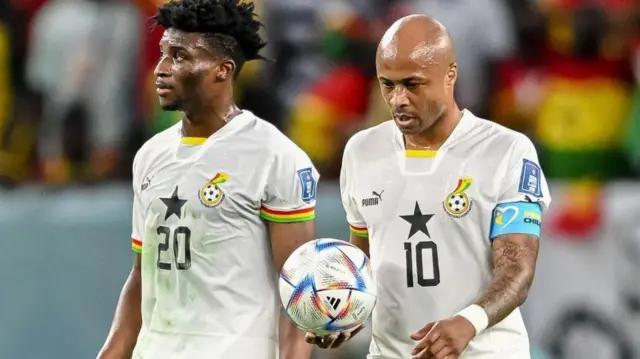 Mohammed Kudus and Andre Ayew react during Ghana's 2022 World Cup group game against Uruguay