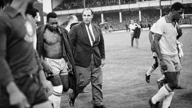 A dejected Pele leaves the field at Goodison Park after being beaten 3-1 by Portugal, 1966.
