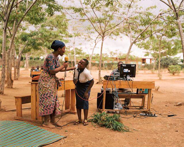 Sandrine and Solonge record a radio play outdoors