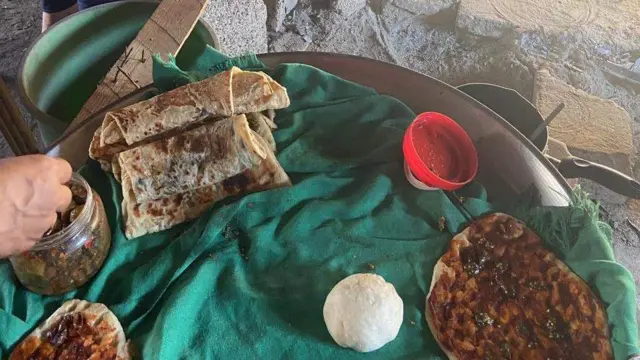 A photograph of manakeesh being prepared before being served