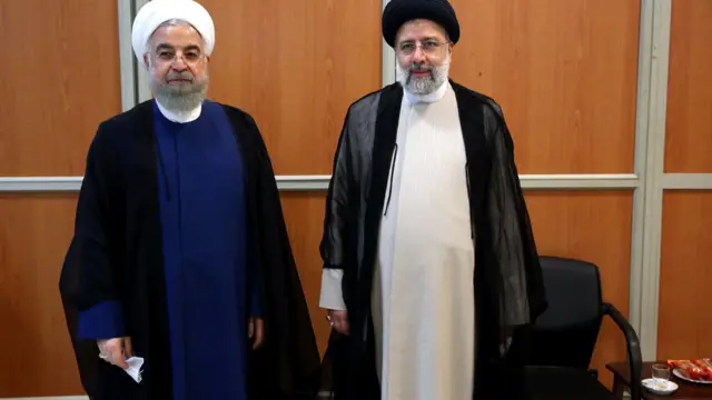 رئيسي وروحاني.