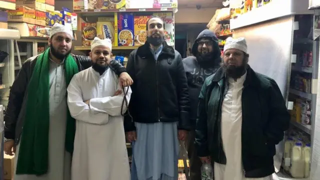 Haleem in white, Mohammed in the hoodie, and friends