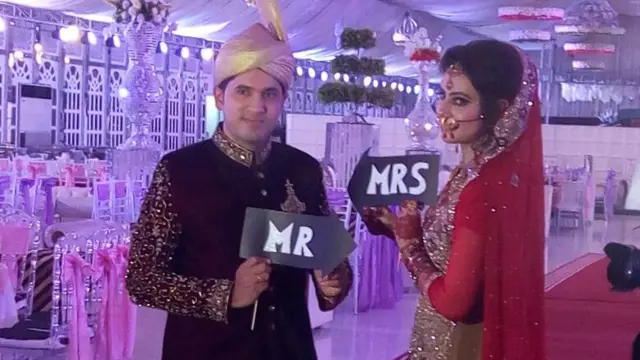 अपनी पत्नी के साथ हनन बुख़ारी