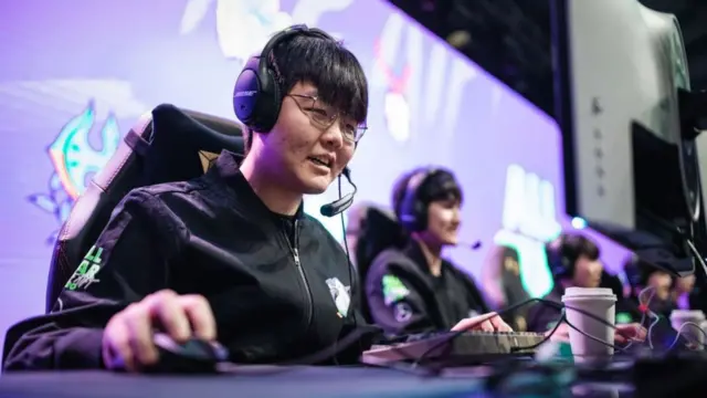 Bai Jia-Hao and Hung Hau-hsuan wearing headset compete on the first day of the League of Legends All-Stars on December 18, 2020 in Shanghai.