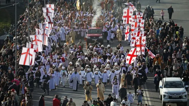 Dozens of people in Tsbilisi in Georgia dey take part for one annual Christmas march