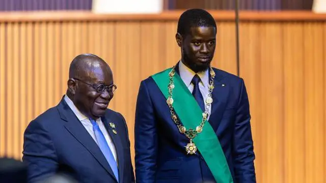 Foto of Bassirou Faye and President Nana Akufo-Addo during Faye'sInauguration