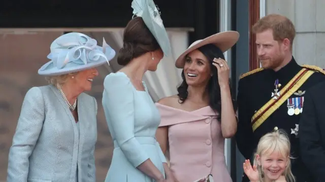 The Duchess of Cambridge wore an Alexander McQueen dress while the Duchess of Sussex wore Carolina Herrera