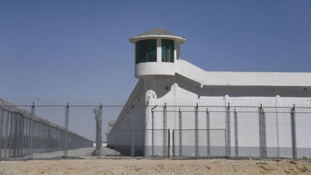 This photo taken on May 31, 2019 shows a watchtower on a high-security facility near what is believed to be a re-education camp where mostly Muslim ethnic minorities are detained, on the outskirts of Hotan, in China's north-western Xinjiang region.