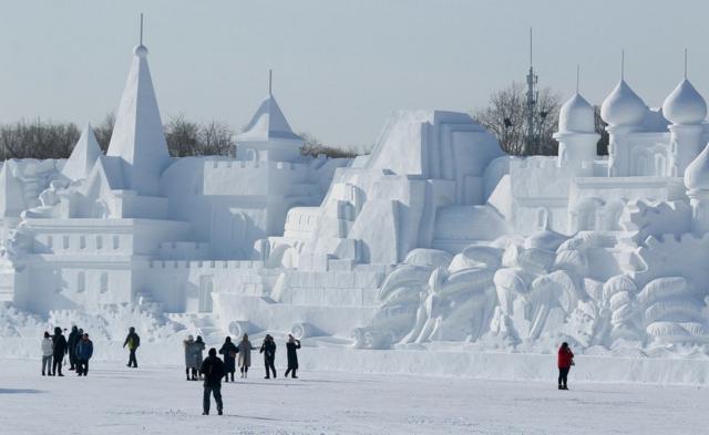 A large snow sculpture of a castle