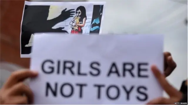 विरोध प्रदर्शन में पोस्टर