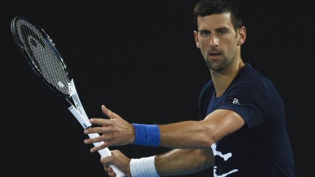 Novak Djokovic of Serbia plays a forehand during a practice session ahead of the 2022 Australian Open at Melbourne Park on January 14, 2022 in Melbourne, Australia.
