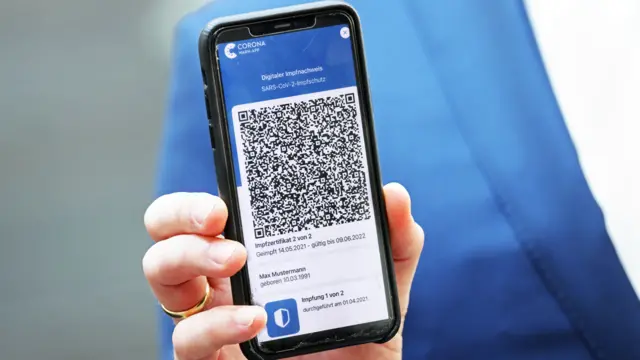 QR code from an EU Digital Covid Certificate on a smartphone screen