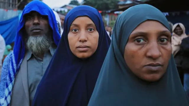 Voters queue up at a polling station for the parliamentary and regional elections in Beshasha, Ethiopia - Monday 21 June 2021