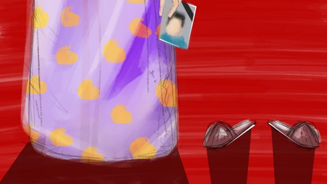 امرأة وصورة رجل