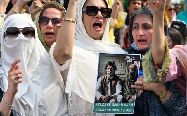 Pakistan's former prime minister Imran Khan's supporters protest outside the court in Islamabad. 