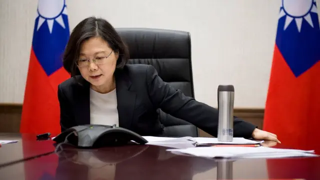 Taiwan"s President Tsai Ing-wen speaks on the phone with U.S. president-elect Donald Trump at her office in Taipei