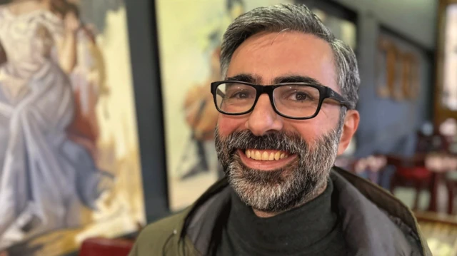Yazar Odai al-Zobi'nin portre fotoğrafı.  