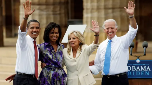 US Democratic presidential candidate Senator Barack Obama (D-IL) (L) and his wife Michelle wave together with Obama"s vice presidential running mate Senator Joe Biden (D-DE) (R) and his wife Jill during a campaign event at the Old State Capitol in Springfield, Illinois, U.S., August 23, 2008