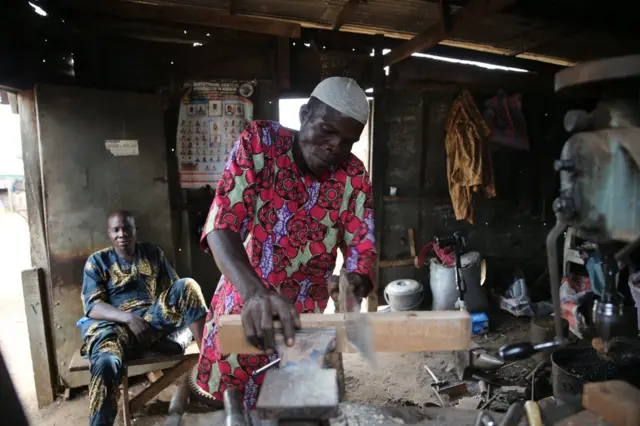 A blacksmith at work.