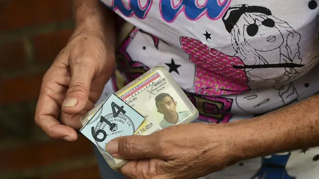 En la fila de la compra