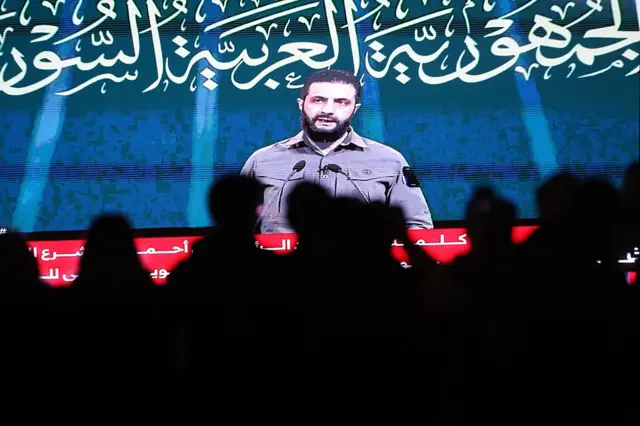 Ахмед аш-Шараа выступает с речью