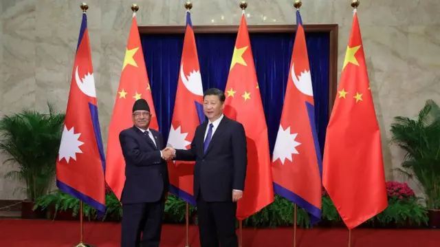 ২০১৭ সালে চীন সফররত নেপালের প্রধানমন্ত্রী প্রচণ্ডা আর চীনের প্রেসিডেন্ট শি জিনপিং - ফাইল চিত্র