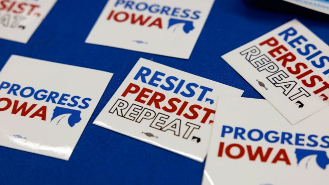 印有“抵制、坚持、重复”(Resist. Persist. Repeat.)及“爱荷华进步”(Progress Iowa)字样的徽章