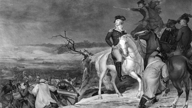 George Washington a caballo mirando hacia atrás a las tropas que cruzan el río Delaware la noche anterior a la Batalla de Trenton, el 25 de diciembre de 1776.