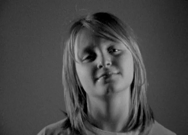 A young girl in black and white