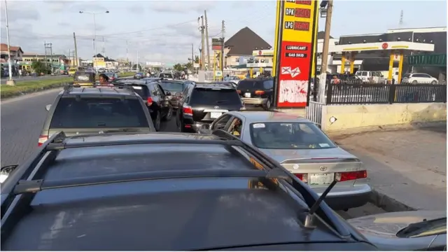 Long queue of cars for petrol filling stations