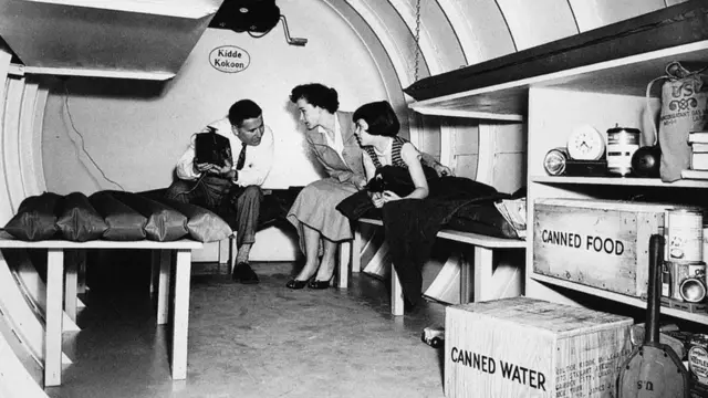 BOMB SHELTER, 1955. /nAn American family in a backyard bomb shelter, Garden City, New York, 1955