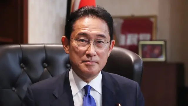 Former Japanese Foreign Minister Fumio Kishida poses for a picture following a press conference