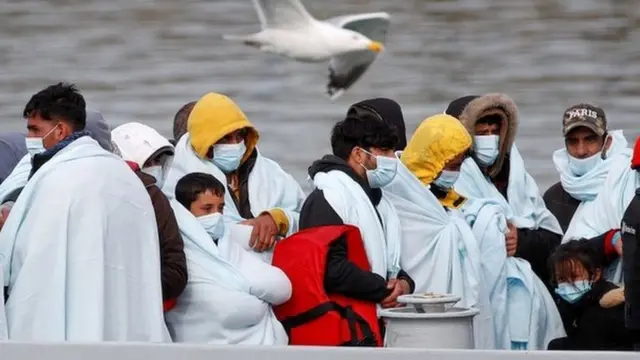 Migrants waiting to disembark at Dover
