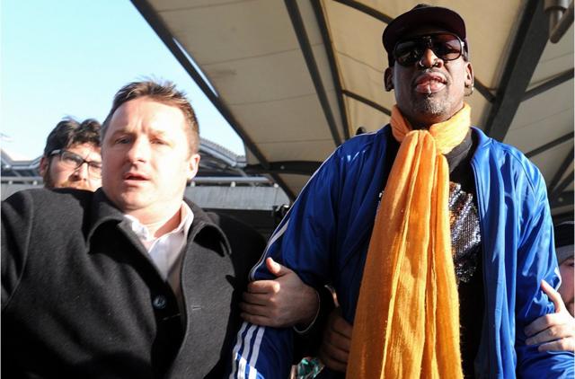 In this file photo taken on January 13, 2014 Michael Spavor (L) and former US basketball player Dennis Rodman (R) arrive at Beijing International Airport from North Korea. - Ottawa on December 13, 2018 identified the second Canadian questioned in China as Michael Spavor, and said he has been missing since he last made contact with Canadian officials. (Photo by WANG Zhao / AFP)WANG ZHAO/AFP/Getty Images