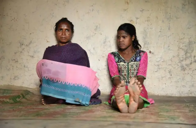 Mother Badri Bai (left) has tattoos all over her body, daughter Anita has one and she has refused to get any more