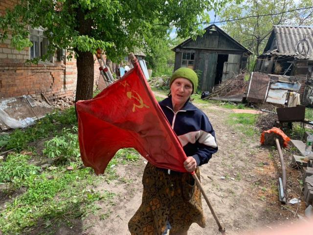 grandmother with red flag