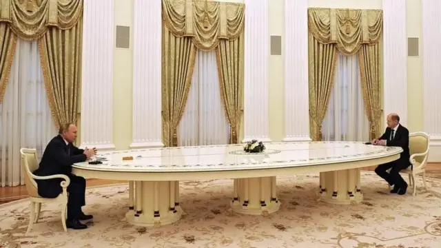 путін