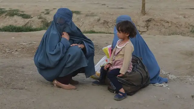 Mujeres con un niño