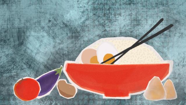 رسم توضيحي لطبق من الأرز ومعه خضراوات