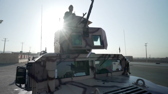 Image of an Afghan soldier in a tank