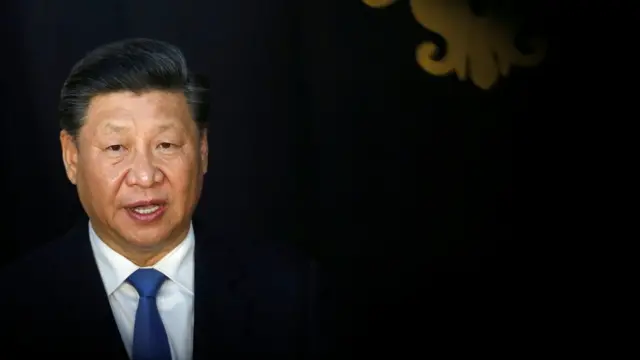 China's President Xi Jinping speaks to journalists in Lisbon